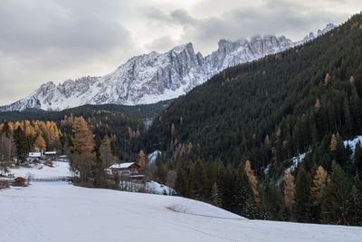 Scenic view of mountains against sky during winter