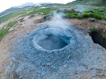 Geothermal active zone in hveragerdi, iceland with volcanic hot spring, fumarola