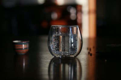 Close-up of wine glass on table