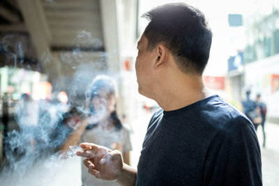 Man smoking cigarette