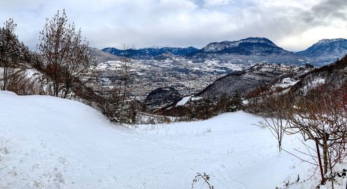 Scenic view of snowcapped mountains against sky