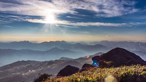 Scenic view of mountains against sky during sunset