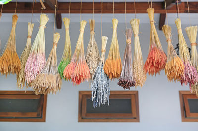 Low angle view of decorations hanging on building