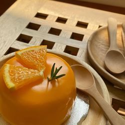 Close-up of orange cake on table