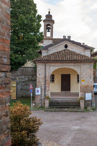 View of church in front of house
