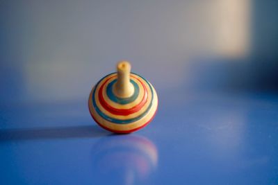 Close-up of multi colored ball on table