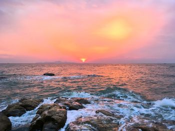 Scenic view of sea against sky during sunset