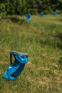 Blue umbrella on field