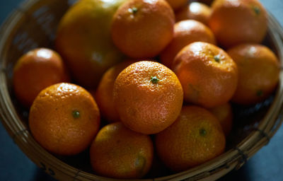 High angle view of orange in basket