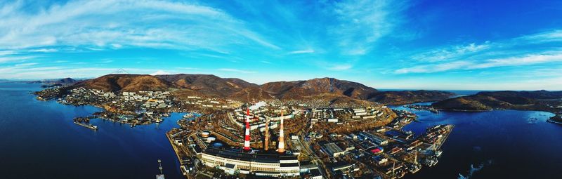 High angle view of bay against blue sky