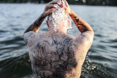 Close-up of man in lake