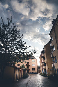 Street amidst buildings against sky