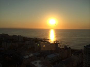 Scenic view of sea at sunset