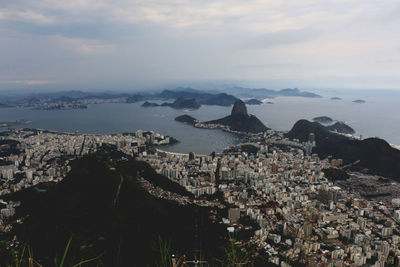 Cityscape with sea in background