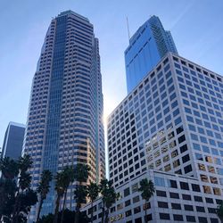 Low angle view of modern buildings against sky