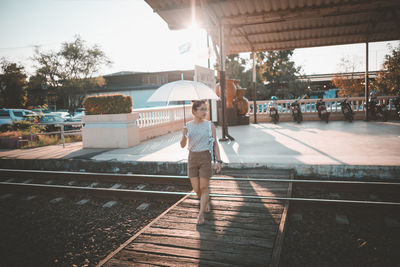 Boy on railroad track