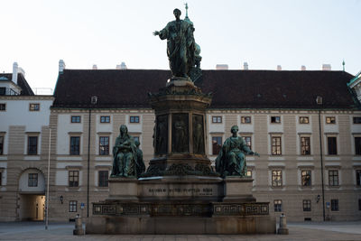 Low angle view of statue in city