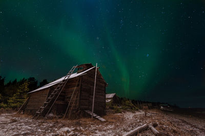 Abandoned building against sky at night