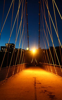 View of suspension bridge at night