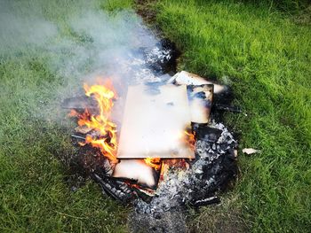 High angle view of bonfire on field