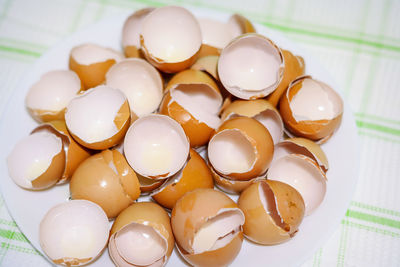 High angle view of eggs in plate on table