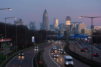 High angle view of vehicles on multiple lane highway at dusk