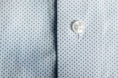 Full frame shot of fabric with button