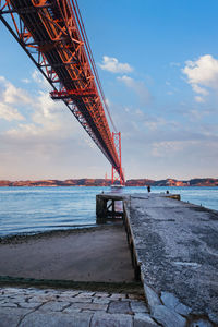 Pier over sea against sky