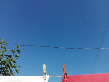 Low angle view of built structure against blue sky