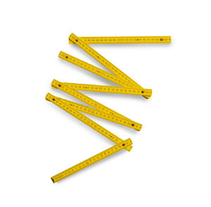 Folding ruler on white background