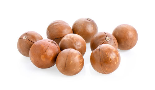 Close-up of fruits against white background