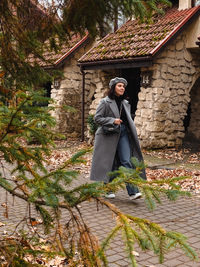 Full length of woman standing on field