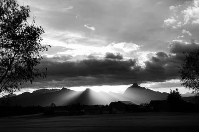 Scenic view of silhouette mountains against sky