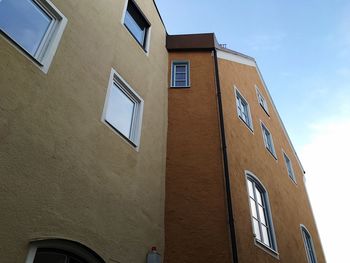 Low angle view of building against blue sky