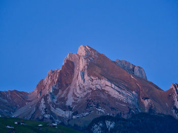 Majestic mountain peak against sky at the blue hour
