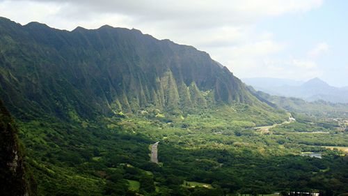 Scenic view of tree mountains against sky