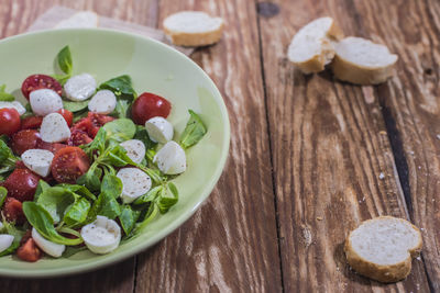 High angle view of salad in bowl on table