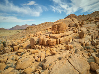 Scenic view of rocky mountains against sky