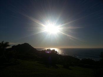 Scenic view of sea against sky on sunny day