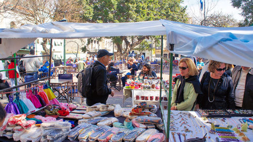 People at market stall