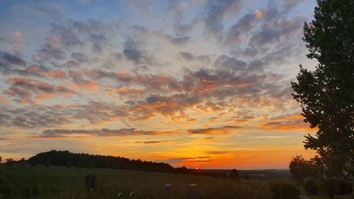 Scenic view of silhouette landscape against sky during sunset