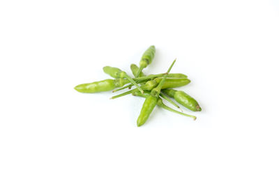 Close-up of green pepper against white background