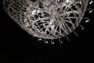 Low angle view of illuminated chandelier