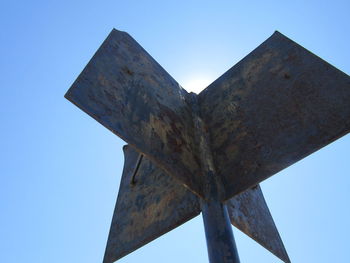 Low angle view of built structure against clear blue sky