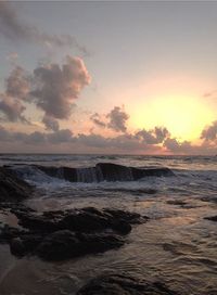 Scenic view of sea at sunset