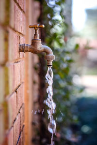 Close-up of water spraying from pipe