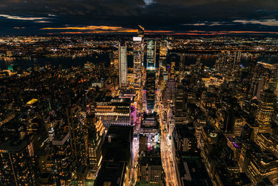 High angle view of illuminated cityscape at night