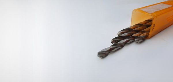 High angle view of coffee on white table