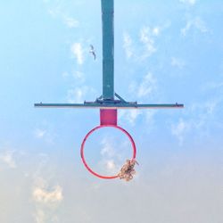 Low angle view of basketball hoop against sky