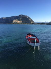 Scenic view of sea against clear blue sky